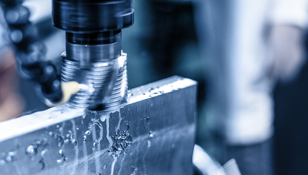Closeup of metal router manufacturing equipment